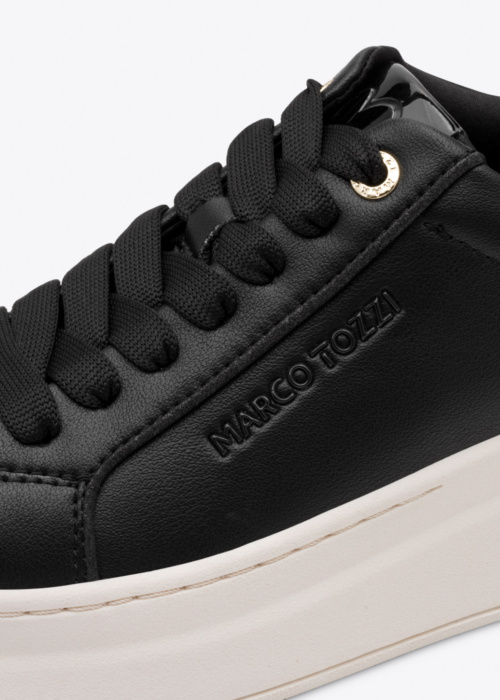 Marco Tozzi tennised