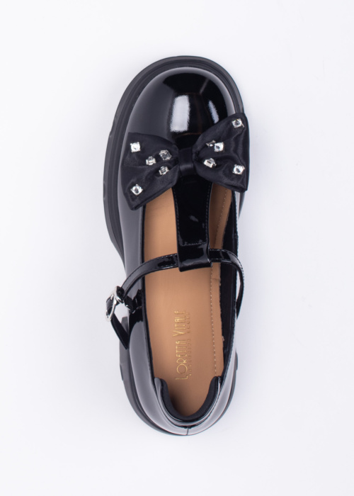 Loretta Vitale kingad