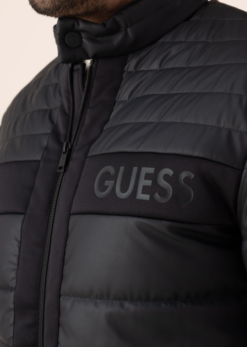 Guess tagi Logo